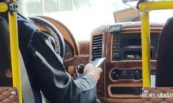 Bursa’da minibüs şoföründen tehlikeli telefon kullanımı
