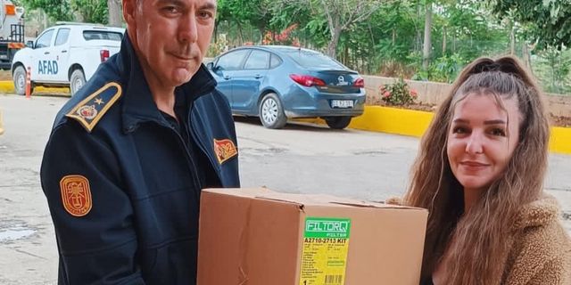 Edirne'de aracın motoruna sıkışan kediyi, kurtarma çalışmalarını izleyen hayvansever sahiplendi