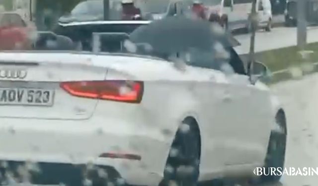 Nilüfer’de Sürücü, Yağmurda Şemsiyeyle Seyahat Etti